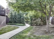Thumbnail 4 of 19 - Courtyard Walking Path at London House Apartments, Lenexa