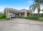Thumbnail 20 of 84 - mail house with drive-through access and package lockers