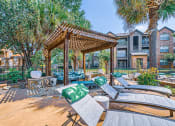 Thumbnail 27 of 38 - Relaxing Pool Area With Sundeck at River Pointe, Conroe, TX, 77304