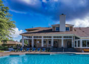 Thumbnail 17 of 27 - a house with a swimming pool in front of it  at Butternut Ridge, North Olmsted