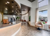 Thumbnail 9 of 28 - a lobby with a reception desk and a large window at CityView, North Kansas City, Missouri