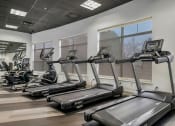 Thumbnail 6 of 28 - the gym is equipped with treadmills and ellipticals at CityView, North Kansas City, MO, 64116