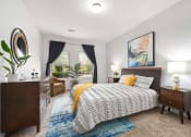 Thumbnail 9 of 39 - a bedroom with a bed and a window at Sovereign at Overland Park, Overland Park, KS