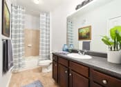 Thumbnail 10 of 39 - a bathroom with a sink and a toilet at Sovereign at Overland Park, Overland Park, 66213