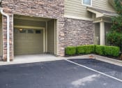 Thumbnail 15 of 39 - a garage door on the side of a building at Sovereign at Overland Park, Kansas, 66213