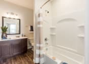 Thumbnail 62 of 64 - tub and vanity in bathroom at Overland Park, Ohio, 43147