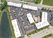 Thumbnail 46 of 59 - A parking lot with a building in the background. at Penn Circle, Indiana, 46032