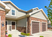 Thumbnail 41 of 46 - front exterior of townhome at Prairie Pines Townhomes, Shawnee, Kansas