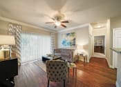 Thumbnail 4 of 38 - natural light in living room space at River Pointe, Conroe, TX