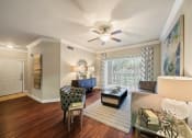 Thumbnail 5 of 38 - living room with natural light at River Pointe, Conroe, 77304