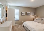 Thumbnail 9 of 46 - Bedroom with cozy bed at Springhill Apartments, Kansas, 66213