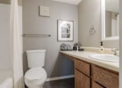 Thumbnail 11 of 46 - Bathroom with Toilet at Springhill Apartments, Overland Park, Kansas