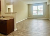 Thumbnail 4 of 66 - A large empty room with a sink and a window at The Greyson, Ohio, 43026