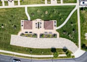 Thumbnail 34 of 59 - A park with a building and a paved walkway.at The Greyson, Hilliard, Ohio