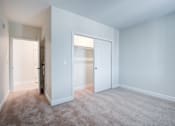 Thumbnail 65 of 73 - A room with a carpeted floor and two doors. at The MK, Indianapolis, IN