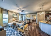 Thumbnail 20 of 38 - Living Room With Kitchen at Waterstone at Cinco Ranch, Katy, TX