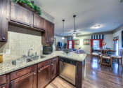 Thumbnail 19 of 29 - dark wood cabinets in kitchen