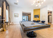 Thumbnail 29 of 40 - Pool Table in living area at Waterstone at Cinco Ranch Apartments, Texas