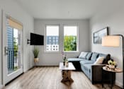 Thumbnail 13 of 52 - The 72nd Apartments | Studio Living Area