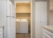 Thumbnail 5 of 36 - Three Bedroom | Kitchen with access to laundry room