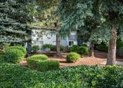 Thumbnail 2 of 20 - The Hideaway | Exterior Building with Mature Landscaping