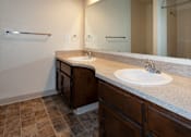 Thumbnail 8 of 40 - a bathroom with two sinks and a large mirror
