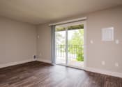 Thumbnail 16 of 29 - Oak Grove Living Room and Patio Doors