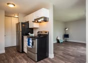 Thumbnail 12 of 29 - Oak Grove Kitchen, Dining and Living Room