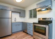 Thumbnail 12 of 20 - The Hideaway | Kitchen with Stainless Steel Appliances