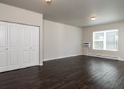 Thumbnail 22 of 48 - Port View Apartments | Spacious Living Room and Dining Room