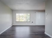 Thumbnail 22 of 27 - Vantage at Hillsdale | #36 Spacious Living Room, Plank Style Flooring and Light Filled Window