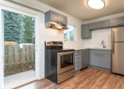 Thumbnail 4 of 20 - The Hideaway | Kitchen with Stainless Steel Appliances