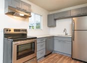 Thumbnail 3 of 20 - The Hideaway | Kitchen with Stainless Steel Appliances
