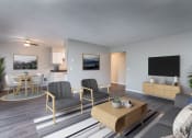 Thumbnail 2 of 27 - an open living room and dining room with a table and chairs