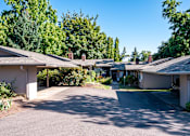 Thumbnail 23 of 24 - A sunny day at the residential area with houses numbered 834.