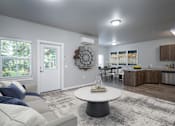 Thumbnail 11 of 13 - A modern living room with a white couch and a round table in the center.