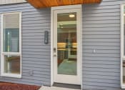 Thumbnail 28 of 45 - the front door of a house with a glass window