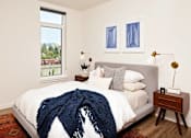 Thumbnail 7 of 36 - Bedroom with queen bed and window
