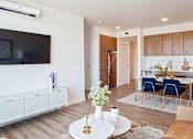 Thumbnail 11 of 36 - One bedroom with TV mounted on wall and split system air conditioning