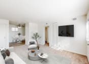 Thumbnail 1 of 41 - a living room with a couch and a coffee table
