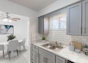 Thumbnail 5 of 41 - an open kitchen and dining room with a table and a sink