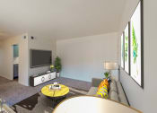 Thumbnail 11 of 41 - a living room with a couch and a tv