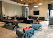 Thumbnail 33 of 57 - A room with a pool table and a television at Purl Apartments, California, 92108