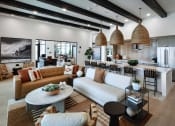Thumbnail 5 of 26 - a living room with a couch and a table at Luma at El Corazon Apartments, Oceanside, CA 92056
