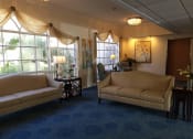 Thumbnail 48 of 59 - Living room with sofa and lights at Savannah Grand of Sarasota, Florida, 34238