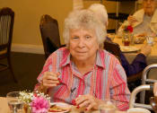 Thumbnail 13 of 59 - Lady eating at Savannah Grand of Sarasota, Sarasota, 34238