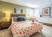 Thumbnail 4 of 20 - a bedroom with a bed and two windows