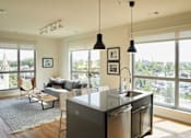 Thumbnail 93 of 113 - the living room and kitchen of an apartment at The Audubon New Haven, New Haven, 06511