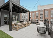 Thumbnail 73 of 113 - Outdoor Shaded Lounge at The Audubon New Haven, New Haven