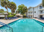 Thumbnail 27 of 38 - our apartments have a large swimming pool and lounge chairs